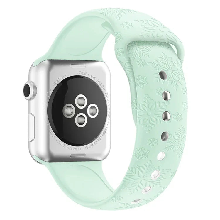 Silikonarmband mit Schneeflockenprägung für Apple Watch Series 7 (41 mm), 6, SE, 5 und 4 (40 mm), 3, 2 und 1 (38 mm), 7 (45 mm), 6, SE, 5 und 4 (44 mm) sowie 3, 2 und 1 (42 mm)