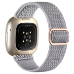 xDfind Wavy Nylon Braided Stretch Watch Band with Adjustment Buckle, For Fitbit Versa 4 / 3 / Sense2 / 1