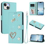 ZS01 Doppellagige Herzblumen Vegane Leder Handyhülle mit Handgelenkschlaufe, Für iPhone 15, Für iPhone 14 Plus, Für iPhone 14 / 13, Für iPhone 14 Pro, Für iPhone 14 Pro Max, Für iPhone 13 Pro Max