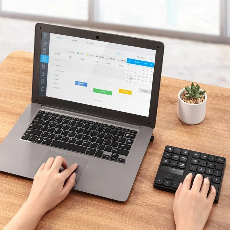 533-Bit-Digitaltastatur mit 35 Tasten, 2,4-GHz-Band, ultradünnem Design und kabelloser Ladefunktion