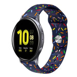 Sportliches Silikonarmband mit Regenbogenpunkten und Dornschließe, passend für Samsung Galaxy Watch 4 (40 mm/44 mm) und Samsung Galaxy Watch 4 Classic (42 mm/46 mm).