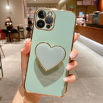 Handyhülle aus TPU mit galvanisiertem Liebesherzhalter, für iPhone 14 Pro Max, für iPhone SE 2022 / 2020 / 7 / 8, für iPhone 13 Pro Max, für iPhone 13 Pro, für iPhone 13, für iPhone 13 mini, für iPhone 12, für iPhone 12 Pro Max