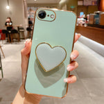 Handyhülle aus TPU mit galvanisiertem Liebesherzhalter, für iPhone 14 Pro Max, für iPhone SE 2022 / 2020 / 7 / 8, für iPhone 13 Pro Max, für iPhone 13 Pro, für iPhone 13, für iPhone 13 mini, für iPhone 12, für iPhone 12 Pro Max