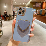 Galvanisierte Liebesherz-Halterung TPU Handyhülle, Für iPhone 17e / 16e, Für iPhone 17 Pro Max, Für iPhone 17 Pro, Für iPhone 17, Für iPhone Air, Für iPhone 16 Pro Max, Für iPhone 16 Pro, Für iPhone 16 Plus