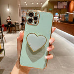 Galvanisierte Liebesherz-Halterung TPU Handyhülle, Für iPhone 17e / 16e, Für iPhone 17 Pro Max, Für iPhone 17 Pro, Für iPhone 17, Für iPhone Air, Für iPhone 16 Pro Max, Für iPhone 16 Pro, Für iPhone 16 Plus
