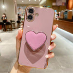 Galvanisierte Liebesherz-Halterung TPU Handyhülle, Für iPhone 17e / 16e, Für iPhone 17 Pro Max, Für iPhone 17 Pro, Für iPhone 17, Für iPhone Air, Für iPhone 16 Pro Max, Für iPhone 16 Pro, Für iPhone 16 Plus