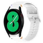 Wavy Grain Stitched Quick Release Silicone Watch Band for Samsung Galaxy Watch 4 model with black watch face and white strap.