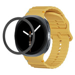 Lünette mit rautenförmiger Textur und farbiges Silikonarmband mit gewellter Ziernaht, passend für Samsung Galaxy Watch8 44 mm und 40 mm.