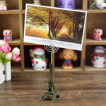 Mini-Eiffelturm-Form-Desktop-Statue Informationszettelhalter Fotoclip Home Art Deco Geschenk, zufällige Farblieferung, Eiffelturm-Form-Kartenhalter