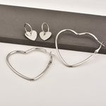 Damen Mode Einfache Metall Liebe Herz Creolen Ohrring-Set