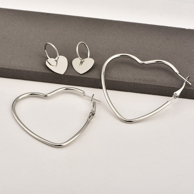 Damen Mode Einfache Metall Liebe Herz Creolen Ohrring-Set