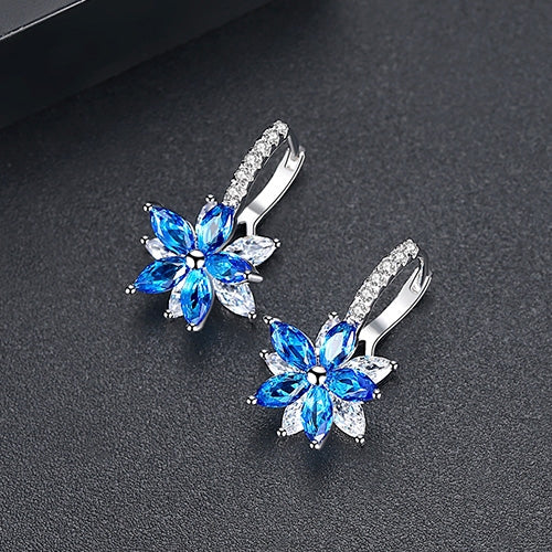 Niedliche, romantische, hübsche Ohrstecker aus Kupfer mit klaren Steinen in Blumenform, praktischem und schlichtem Design, mit Zirkonia, in Blau, Grün, Pink und Gelb