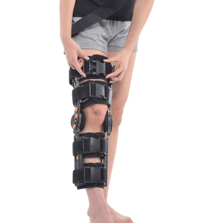 Längenverstellbare Kniebandage für Erwachsene mit 12 Löchern, Ausführung: Klettverschluss (ohne Riemen), Klettverschluss (mit Riemen), Schnalle für einfaches Anlegen (ohne Riemen), Schnalle für einfaches Anlegen (mit Riemen)