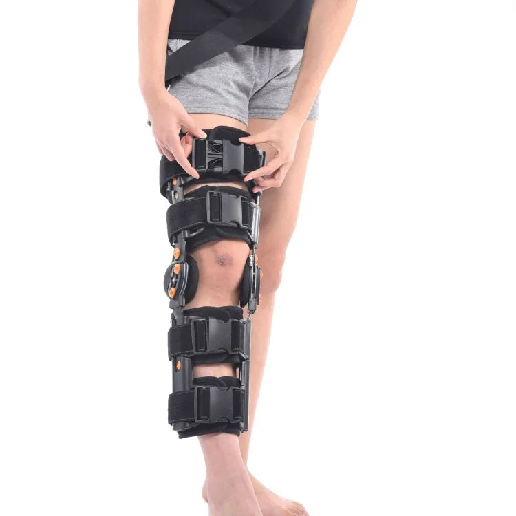 Längenverstellbare Kniebandage für Erwachsene mit 12 Löchern, Ausführung: Klettverschluss (ohne Riemen), Klettverschluss (mit Riemen), Schnalle für einfaches Anlegen (ohne Riemen), Schnalle für einfaches Anlegen (mit Riemen)