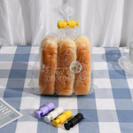 10 Stück H011 Lebensmittelkonservierung und feuchtigkeitsbeständige elastische Dichtungsklammer Snack-Lebensmitteldichtungsklammer, Lila, Weiß, Grün, Schwarz, Gelb