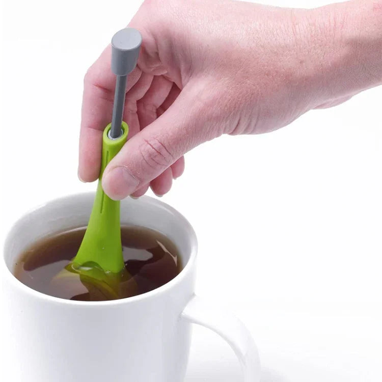 Wiederverwendbares Teesieb mit integriertem Stempel, tragbar, aus lebensmittelechtem Kunststoff, für Tee und Kaffee.